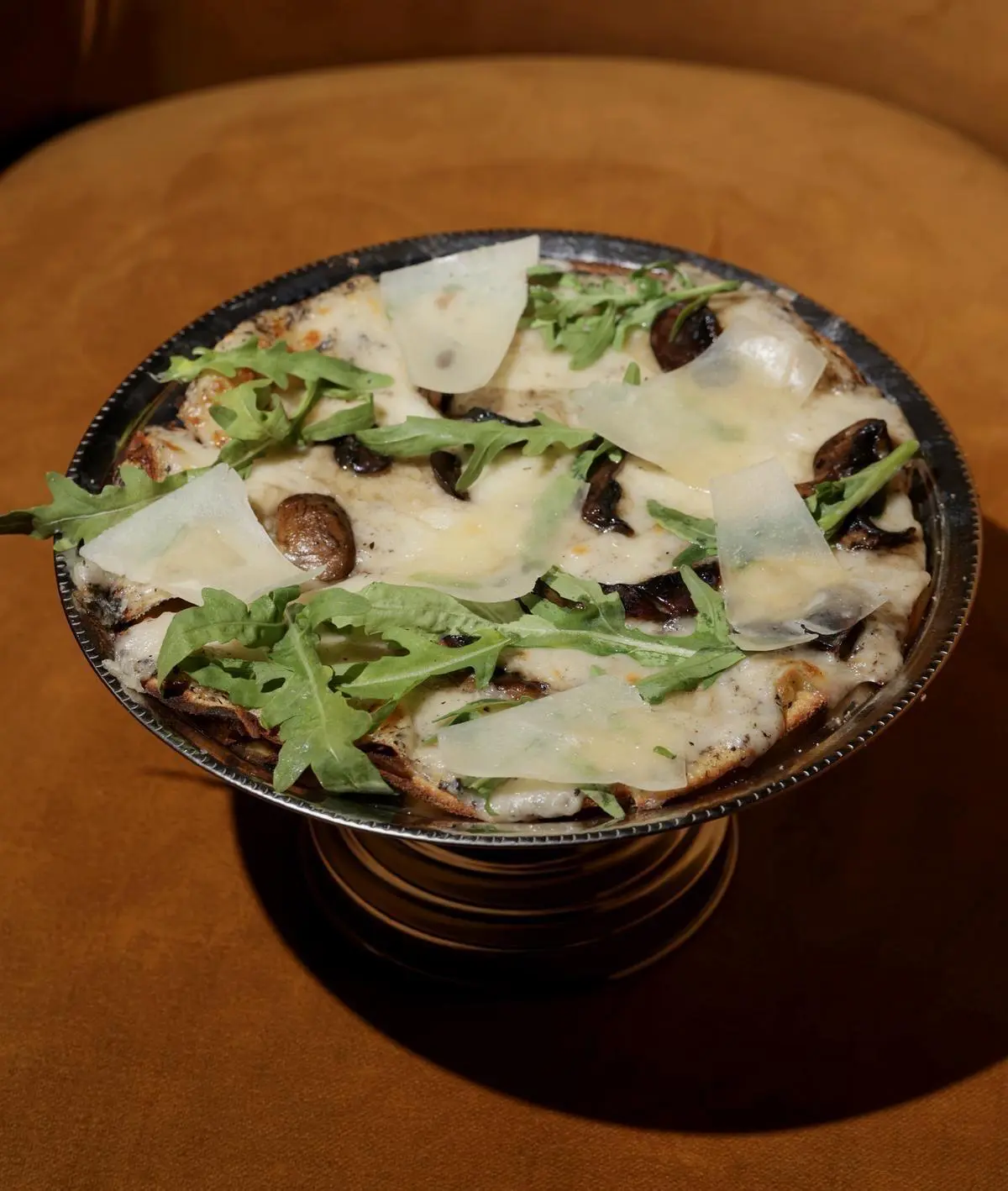 Truffled pizzette & parmesan shavings